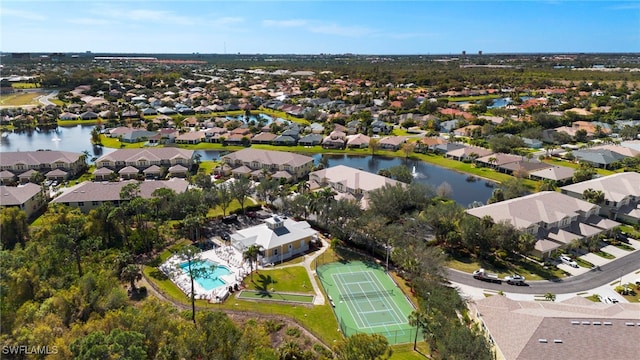 bird's eye view with a water view