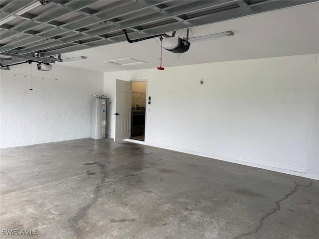 garage featuring a garage door opener and electric water heater