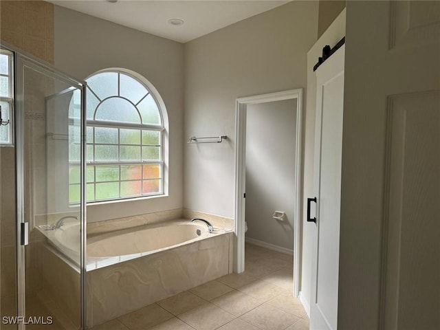 bathroom with toilet, independent shower and bath, and tile patterned flooring