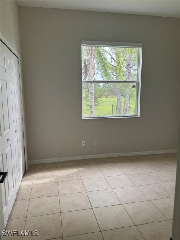 view of tiled spare room