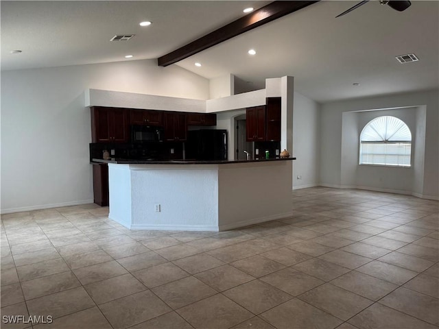 kitchen with light tile patterned flooring, black appliances, dark brown cabinets, and vaulted ceiling with beams