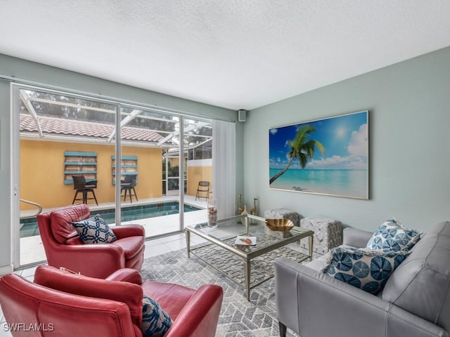 living room featuring a textured ceiling