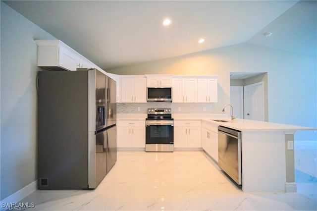 kitchen with sink, white cabinetry, kitchen peninsula, and stainless steel appliances