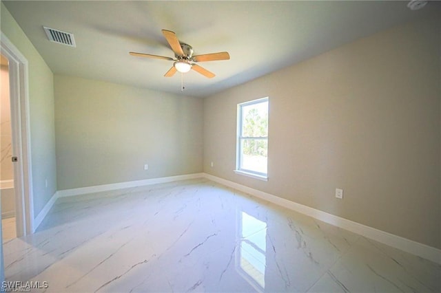 unfurnished room with ceiling fan