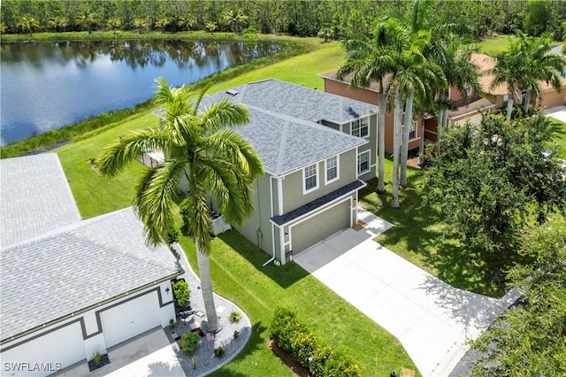 birds eye view of property featuring a water view