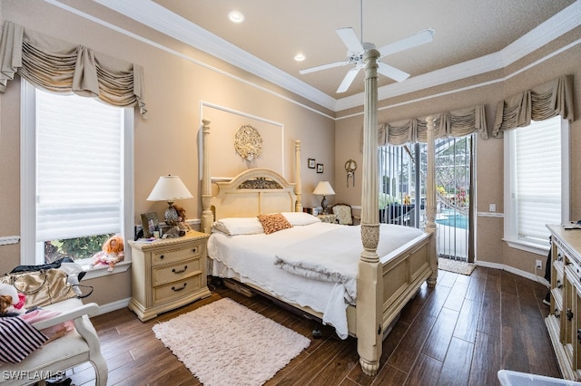 bedroom with ceiling fan, access to outside, dark wood-type flooring, and multiple windows