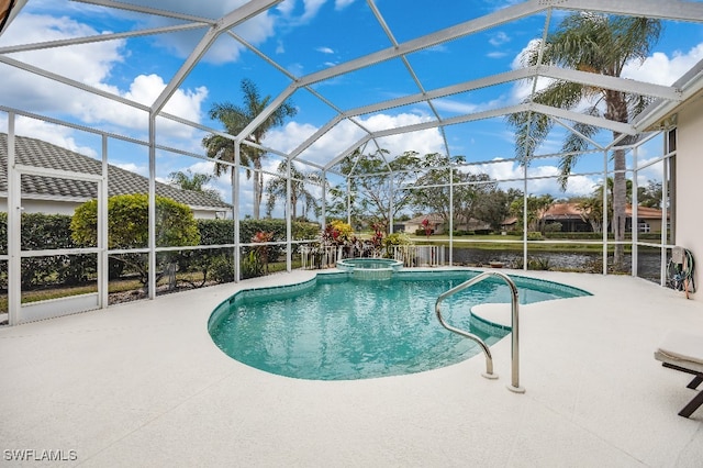 view of swimming pool featuring a water view, glass enclosure, and a patio area