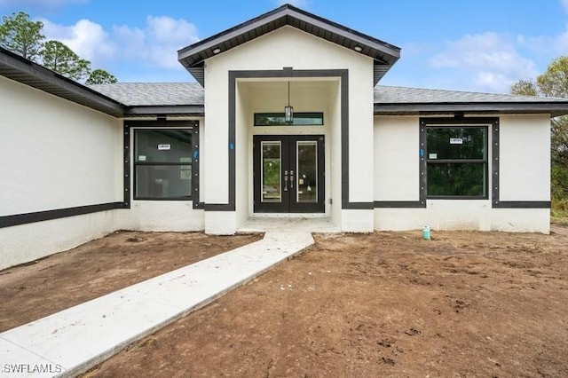 entrance to property with french doors