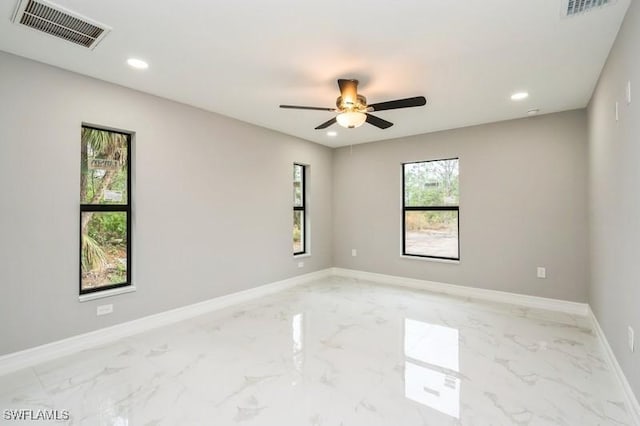 unfurnished room featuring ceiling fan