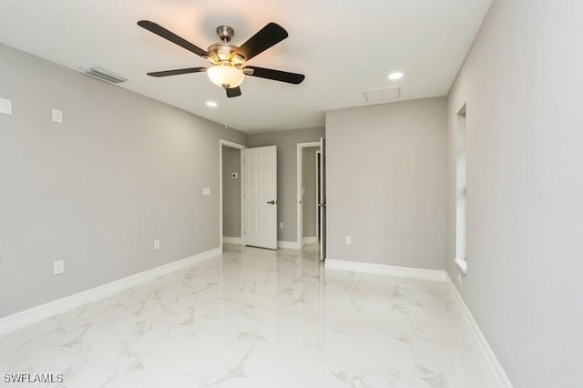 unfurnished room featuring ceiling fan