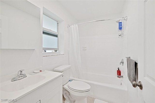 full bathroom with shower / tub combo, vanity, tile walls, and toilet