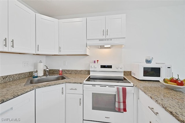 kitchen with white cabinetry, sink, and white appliances