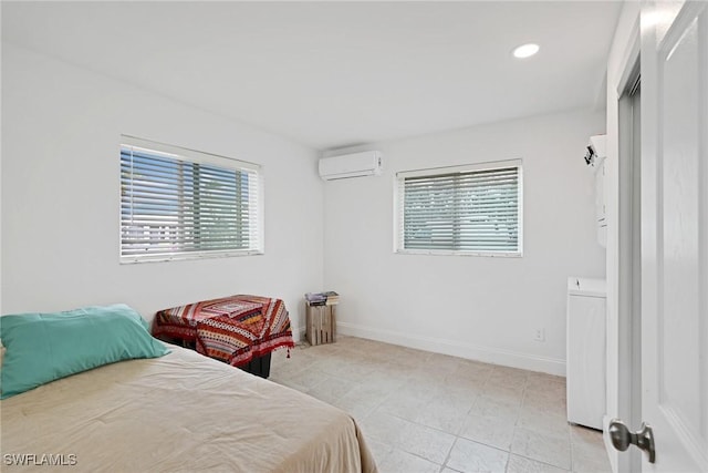 bedroom with a wall unit AC