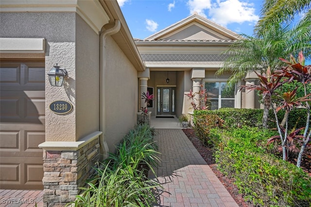 property entrance featuring a garage