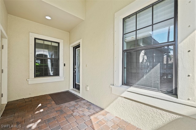 doorway to property featuring a patio area