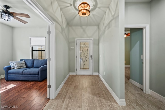 entryway featuring hardwood / wood-style flooring and ceiling fan