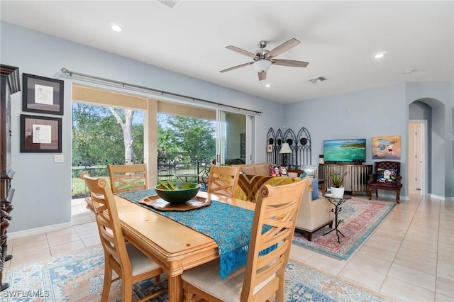 dining area featuring ceiling fan and light tile patterned flooring