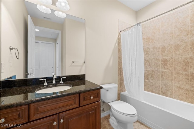 full bathroom with vanity, toilet, and shower / tub combo