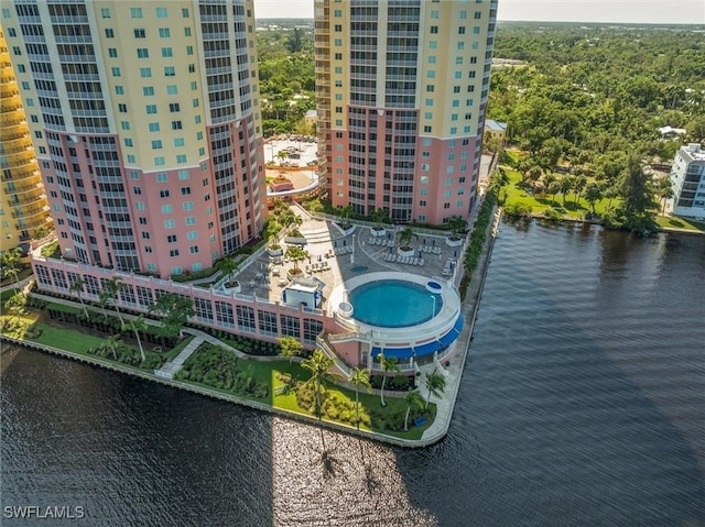 birds eye view of property featuring a water view