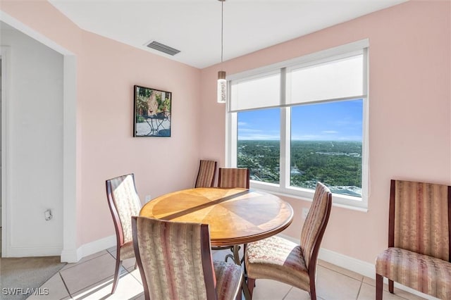 dining room featuring light tile patterned floors