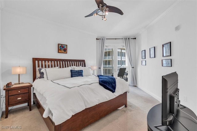 carpeted bedroom featuring ceiling fan, crown molding, and access to outside