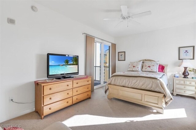 bedroom with ceiling fan and light colored carpet