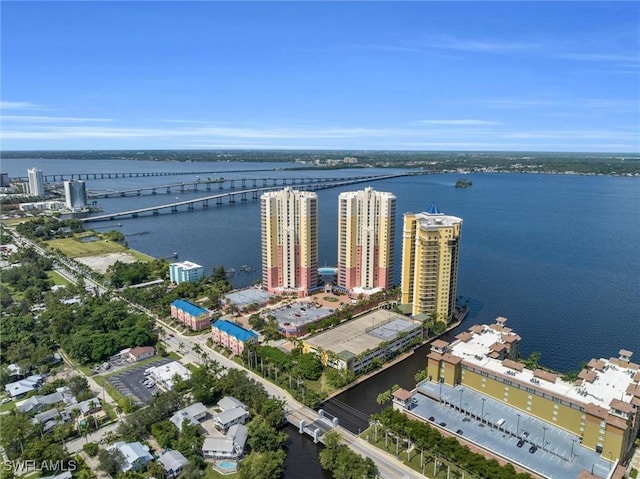 birds eye view of property featuring a water view