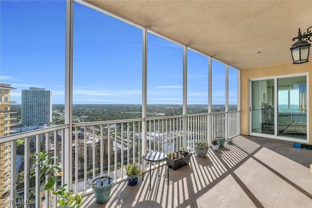 unfurnished sunroom featuring a wealth of natural light