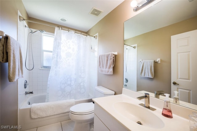 full bathroom featuring shower / bathtub combination with curtain, vanity, toilet, and tile patterned floors