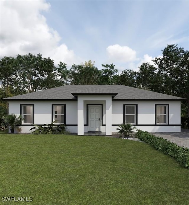 view of front facade with a front yard