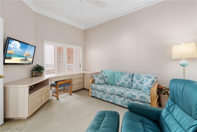 living room with ceiling fan, crown molding, light carpet, and built in desk