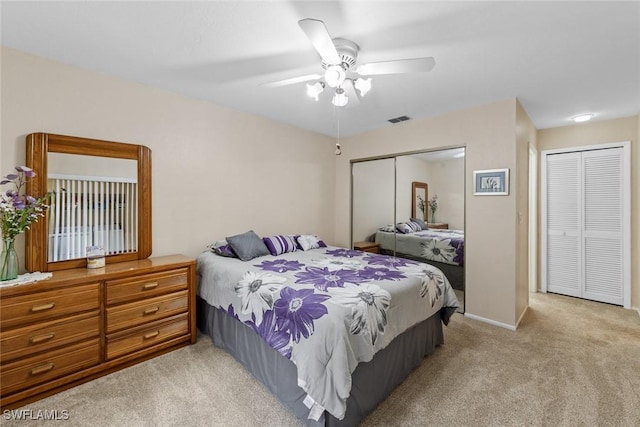 carpeted bedroom featuring ceiling fan