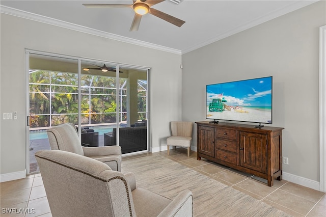 tiled living room featuring ceiling fan and ornamental molding