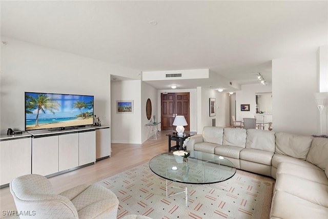 living room with light wood-type flooring