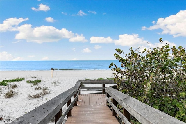 property view of water featuring a beach view