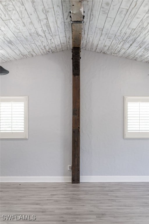 interior space with wooden ceiling and light hardwood / wood-style floors