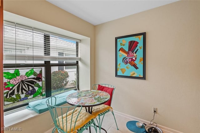 dining room with light tile patterned floors