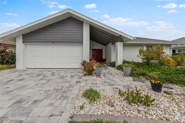 single story home with a garage