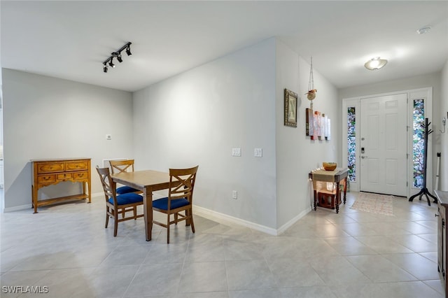 dining room with rail lighting