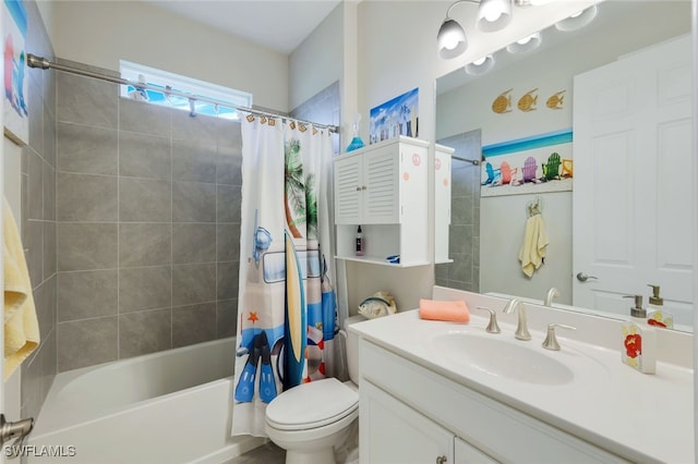 full bathroom with toilet, shower / tub combo, and vanity