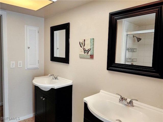 bathroom featuring vanity and a tile shower