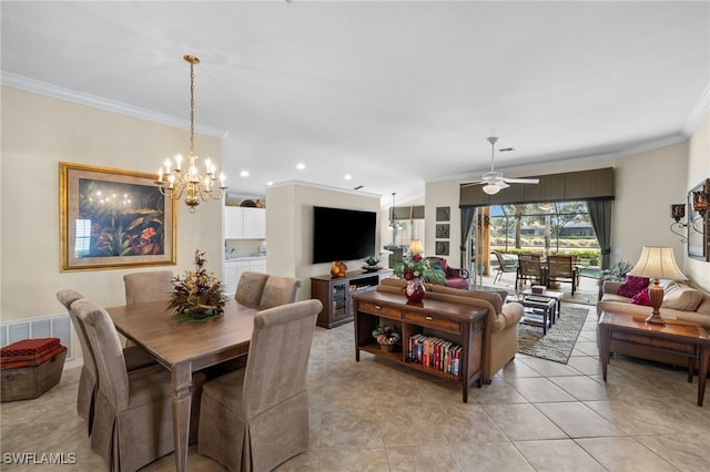 tiled dining area featuring crown molding and ceiling fan with notable chandelier