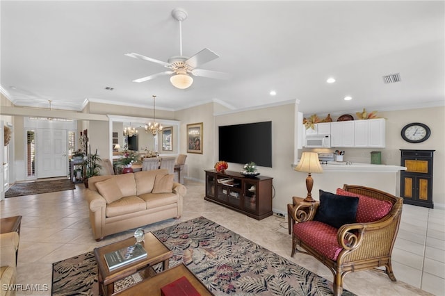 tiled living room with ornamental molding and ceiling fan with notable chandelier