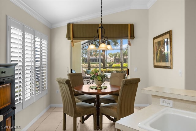 dining room featuring an inviting chandelier, light tile patterned floors, crown molding, and lofted ceiling