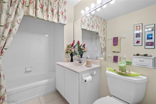 full bathroom featuring tile patterned floors, toilet, vanity, and shower / bath combo