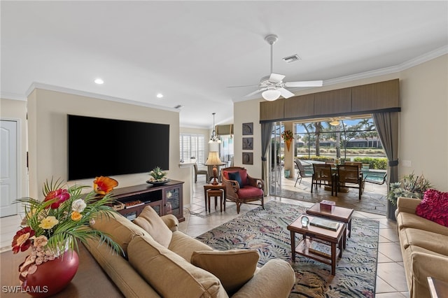 tiled living room with crown molding and ceiling fan