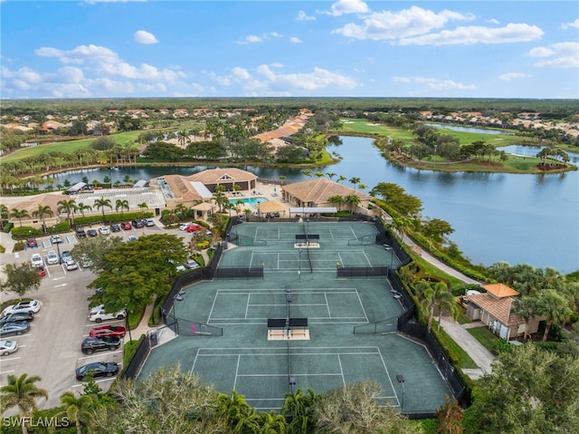 drone / aerial view with a water view