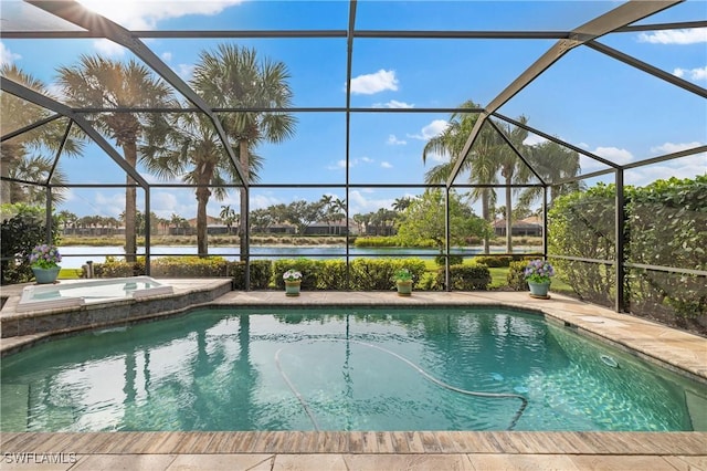 view of swimming pool featuring a water view, an in ground hot tub, a lanai, and a patio