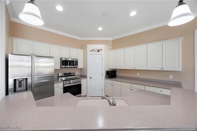 kitchen featuring sink, crown molding, white cabinetry, stainless steel appliances, and decorative light fixtures