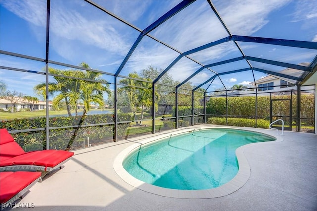 view of pool with a lanai and a patio